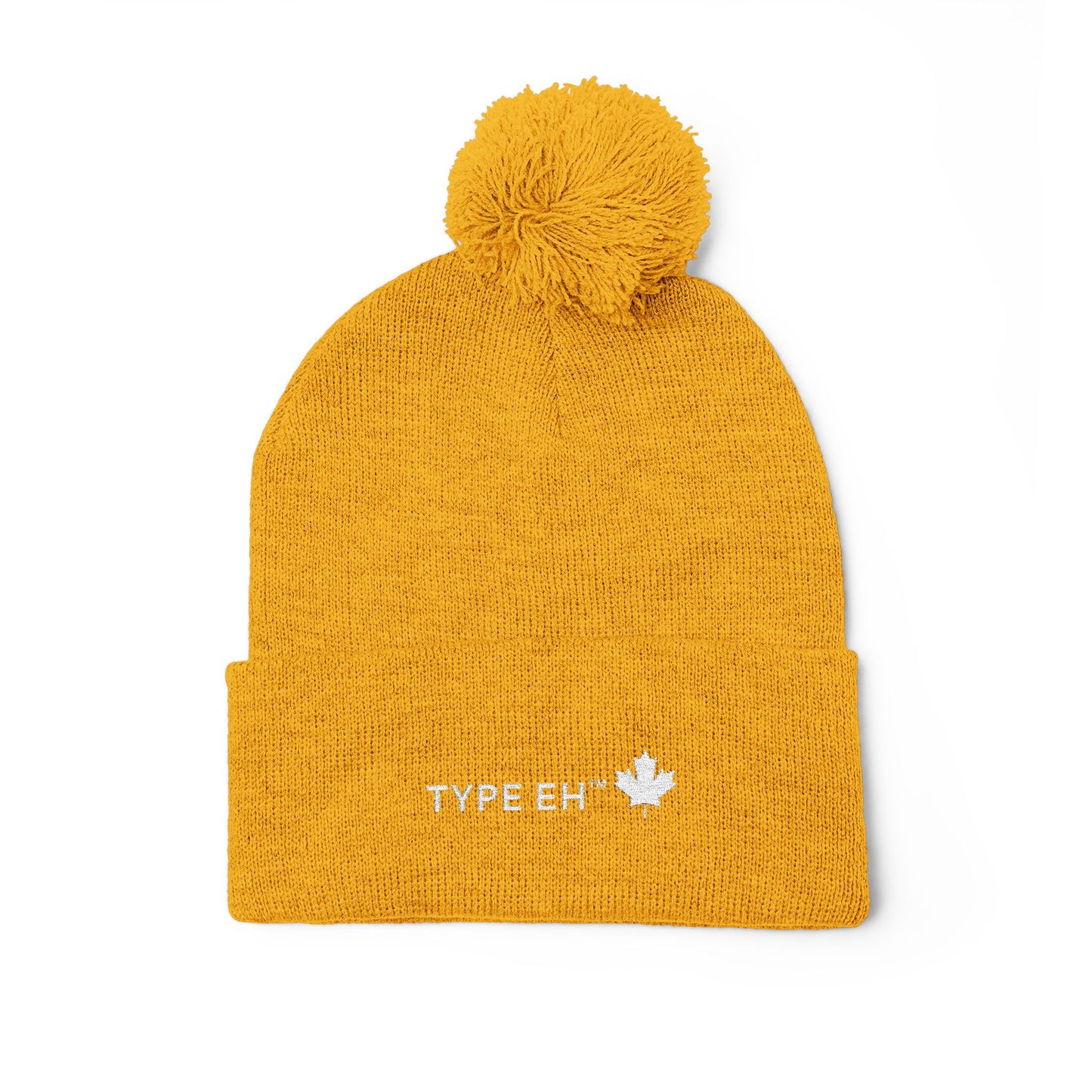 Embroidered Pom-Pom Knit Cap — Cozy Winter Beanie with Subtle Leaf Logo