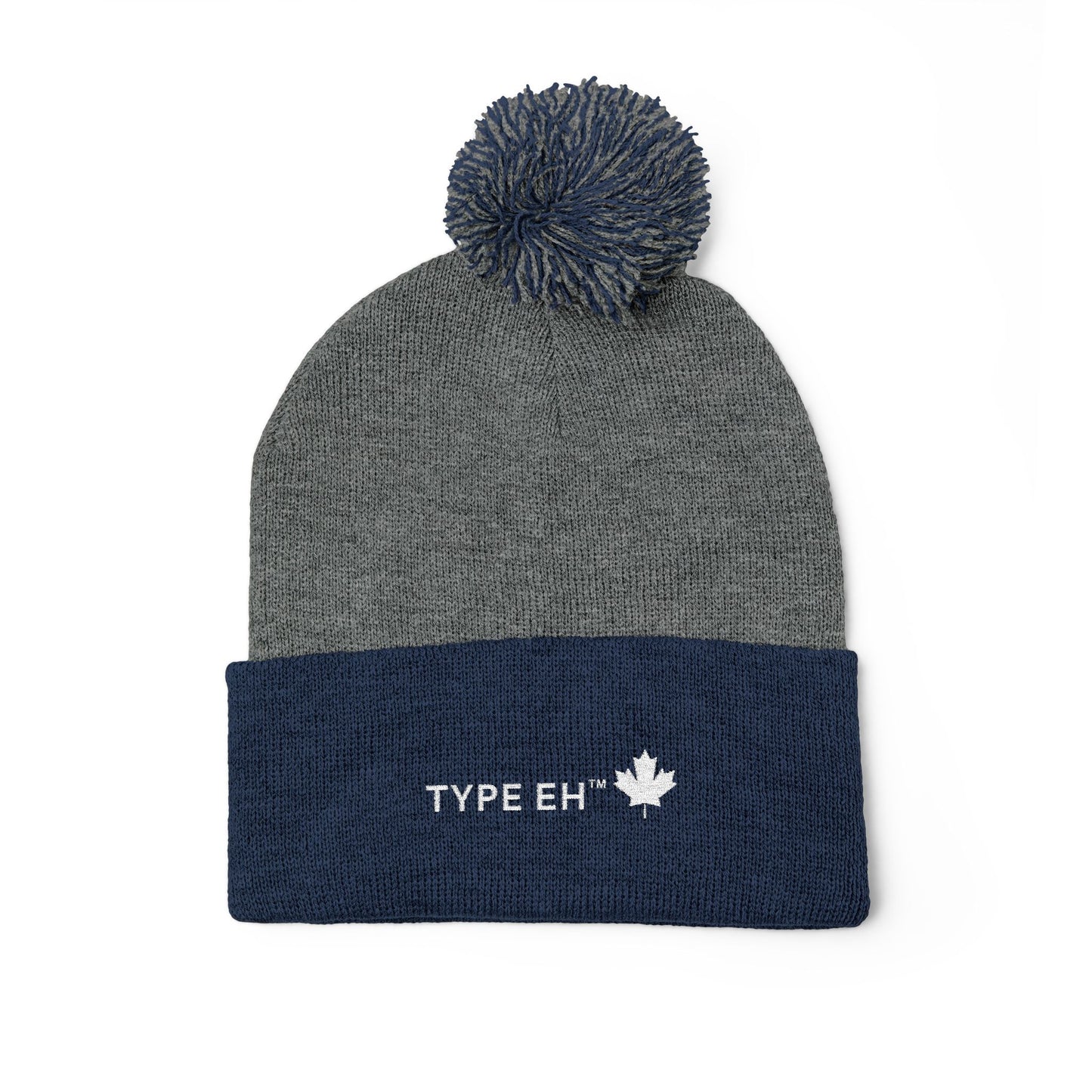 Embroidered Pom-Pom Knit Cap — Cozy Winter Beanie with Subtle Leaf Logo