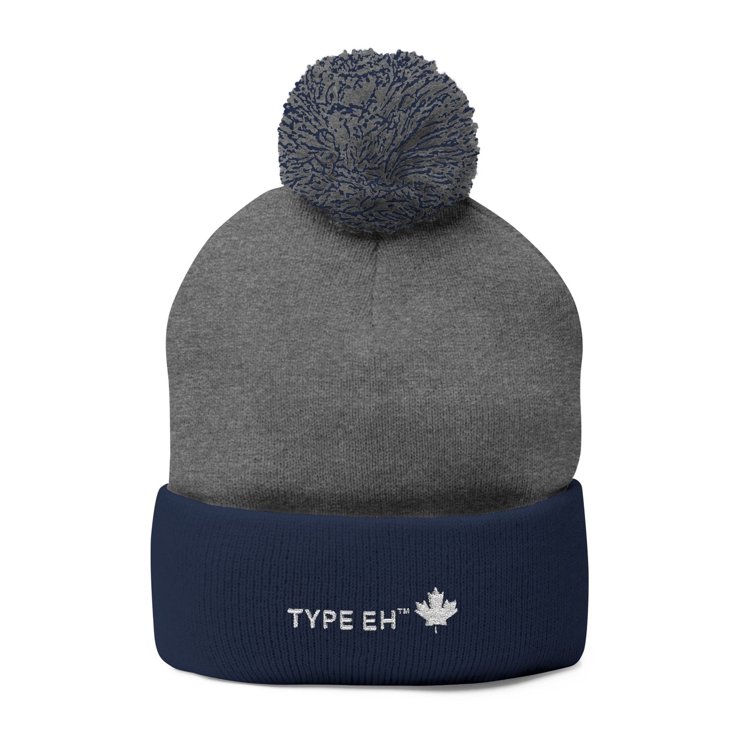 Embroidered Pom-Pom Knit Cap — Cozy Winter Beanie with Subtle Leaf Logo