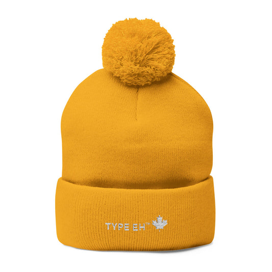 Embroidered Pom-Pom Knit Cap — Cozy Winter Beanie with Subtle Leaf Logo